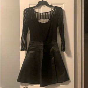 Black mesh and leather dress